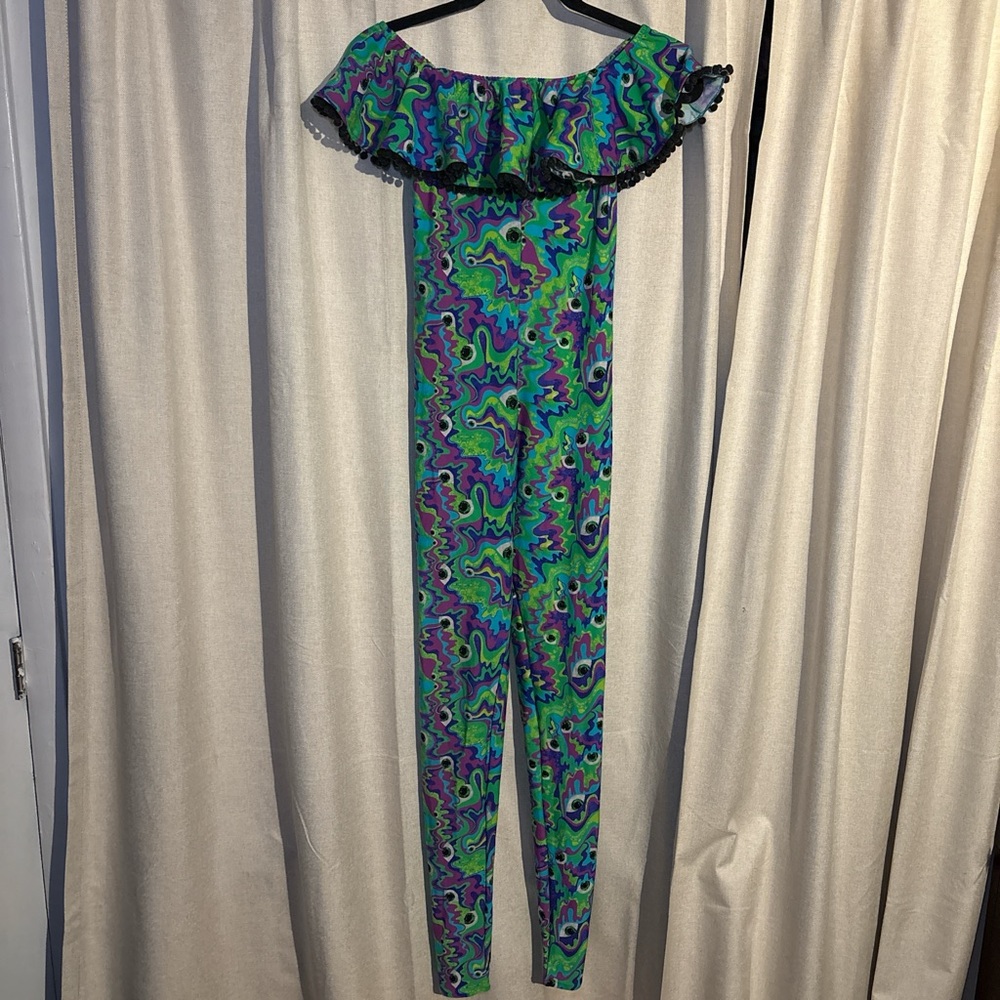 LIMITED EDITION L.O.M off the shoulder Pom
Pom catsuit jumpsuit
